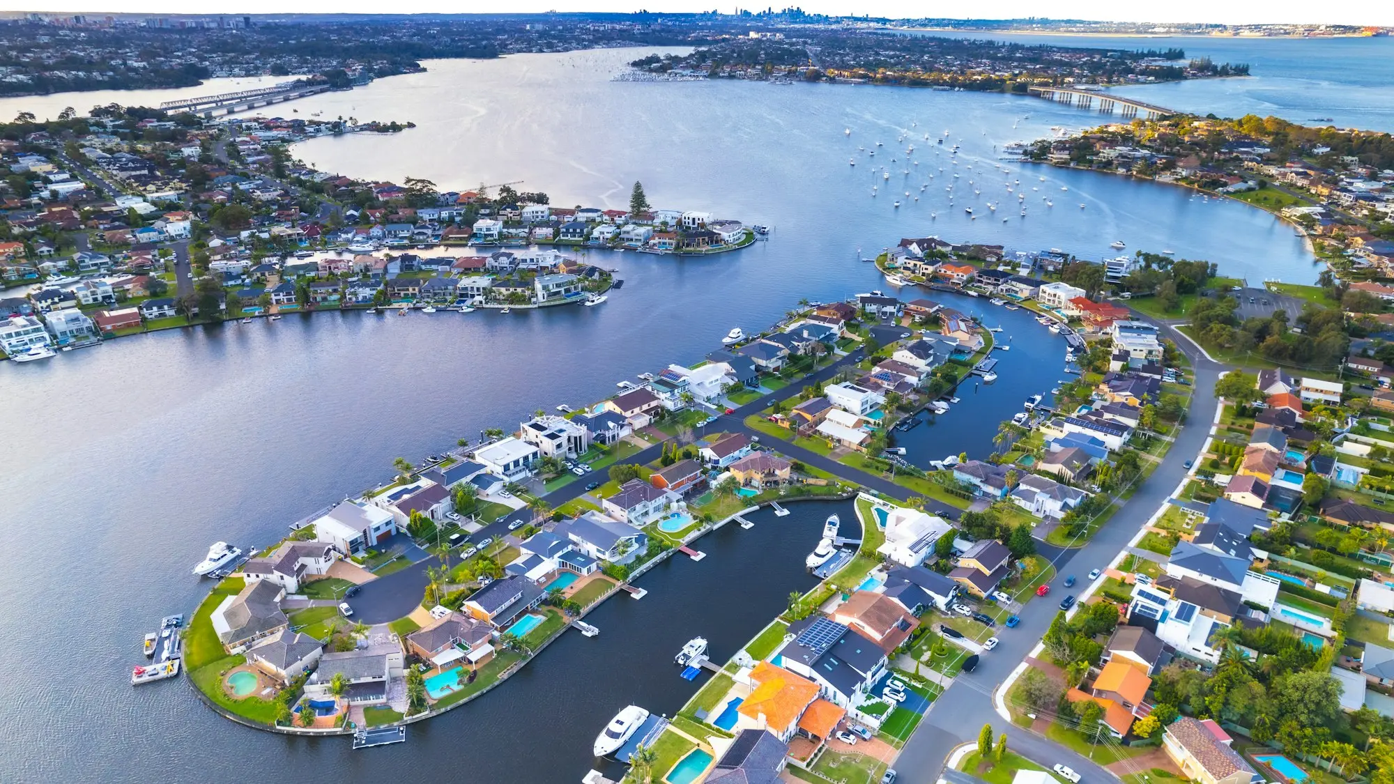 Aerial view of waterfront homes on a canal estate in Queensland